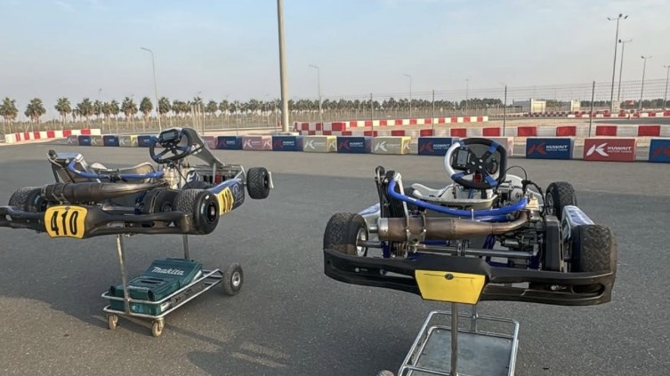 FP Motorsports karts on stands trackside at Kuwait Motor Town